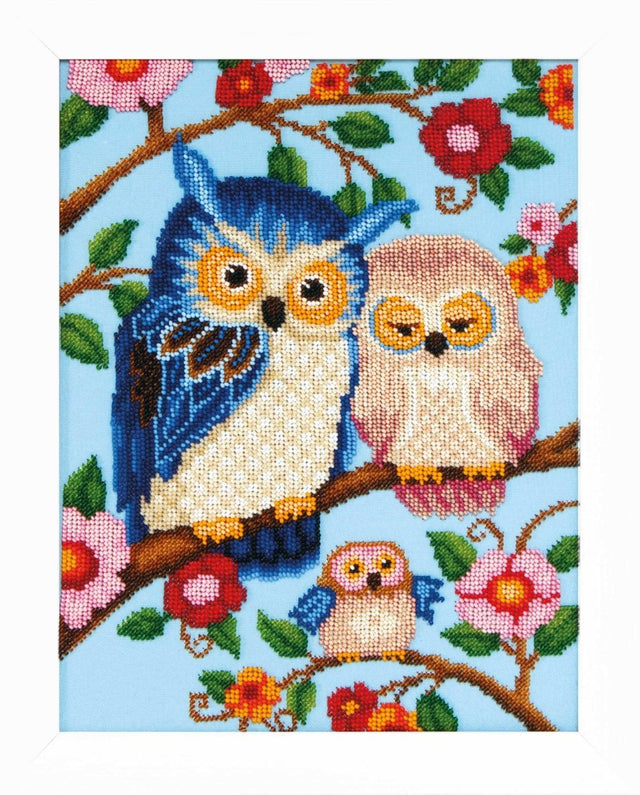 Bead embroidery of a happy family scene