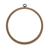 Beech wood embroidery hoop with metal hook.